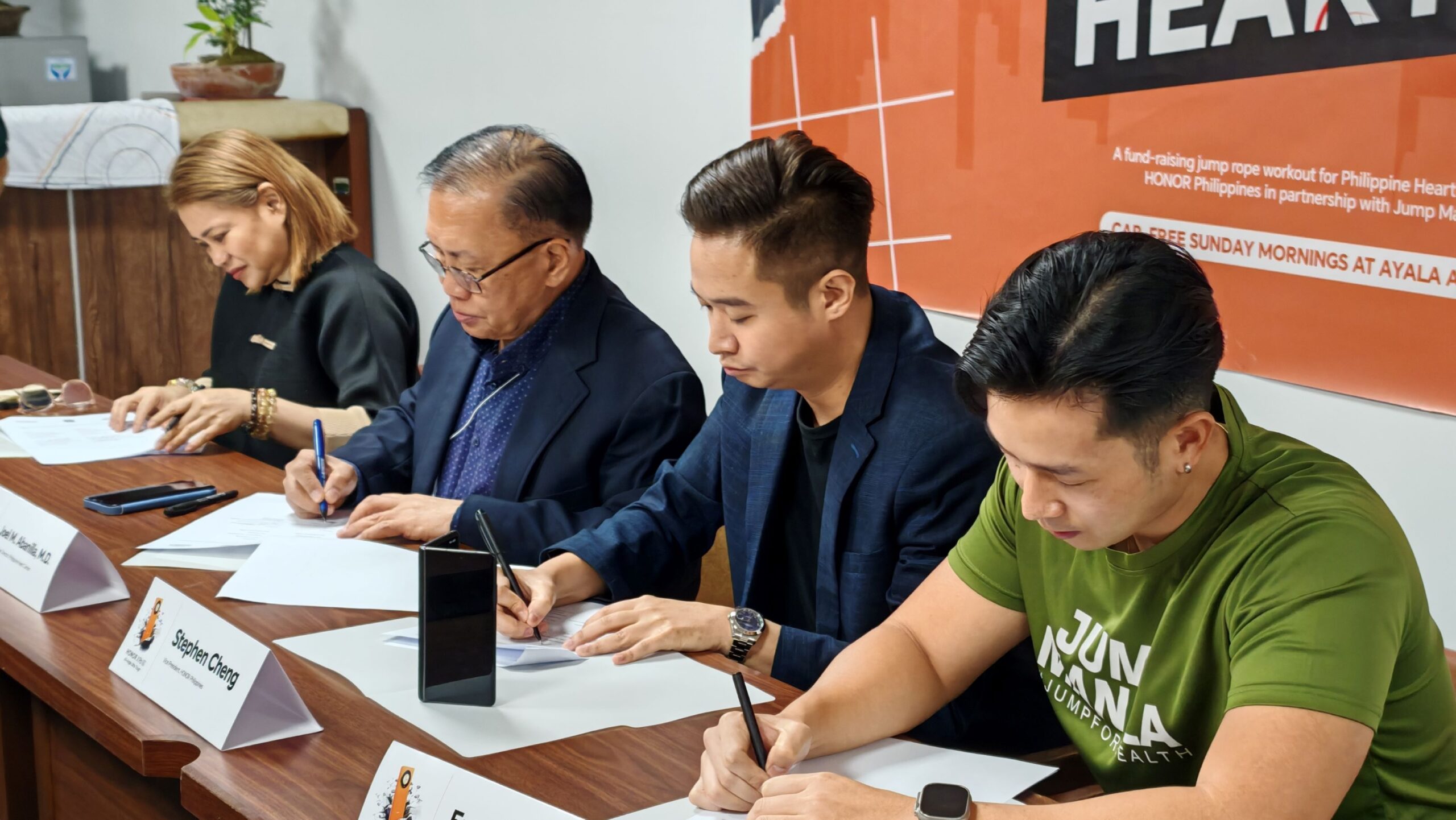 HONOR, PHC, Jump Manila executives in MOU signing.